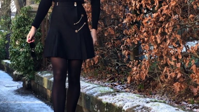 blonde girl in kilt and beret