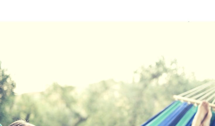 Girl laying on hammock