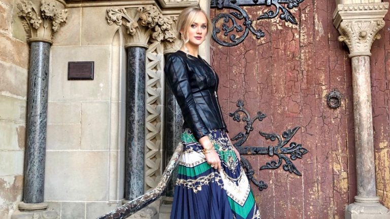 Pleated skirt with leather jacket