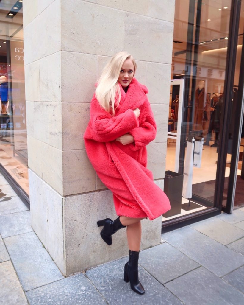 Chani Lillian in Coral teddy coat and black ankle boots