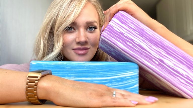 Girl with yoga blocks for wellness