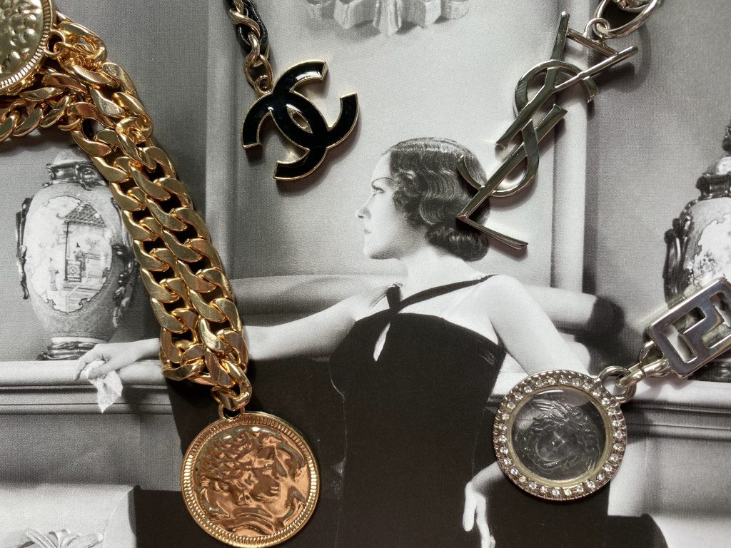 Chain belts on vintage image of a woman in a ball gown