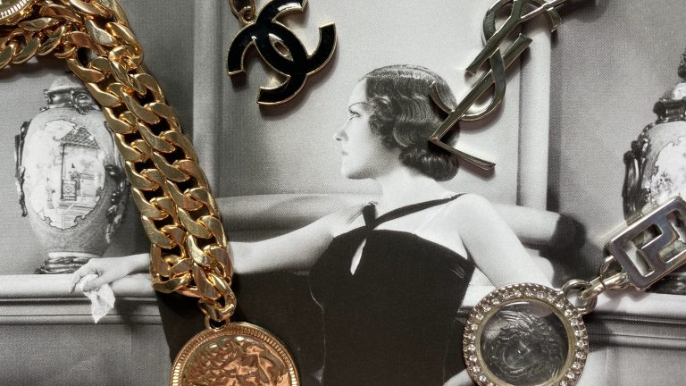 Chain belts on vintage image of a woman in a ball gown