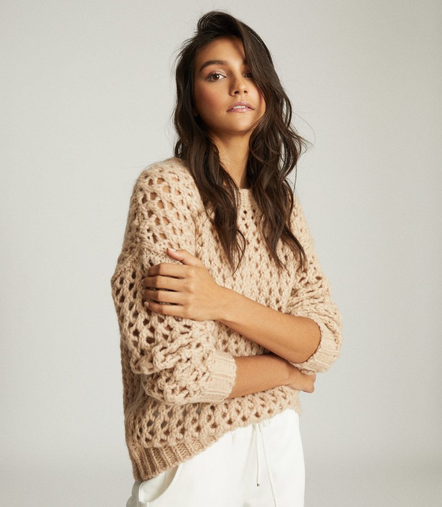 Girl in crochet knit jumper - beige