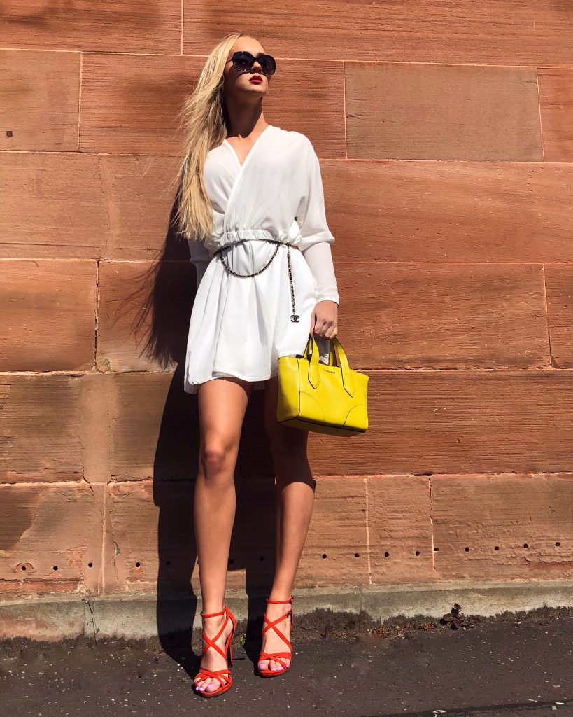 Glow up for summer - girl in sun in white dress