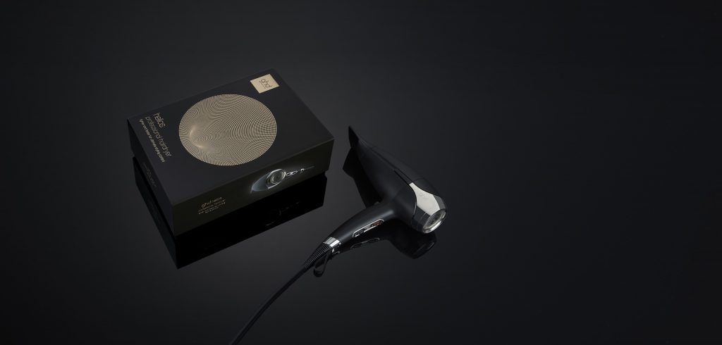 GHD Helios hairdryer in black with black background