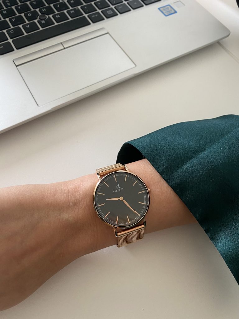 Vizzetti 'Serene Milan' on wrist with green satin sleeve